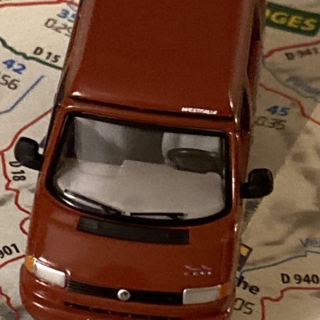 Toy version of red campervan